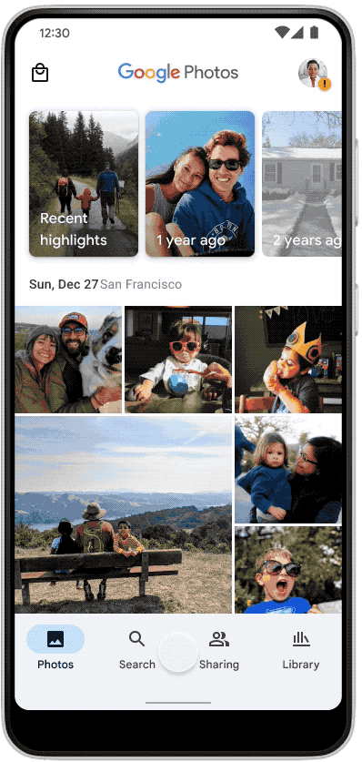 Google Photos home feed with a tap interaction on the Search tab — illustrating contained, focused motion at the point of attention.